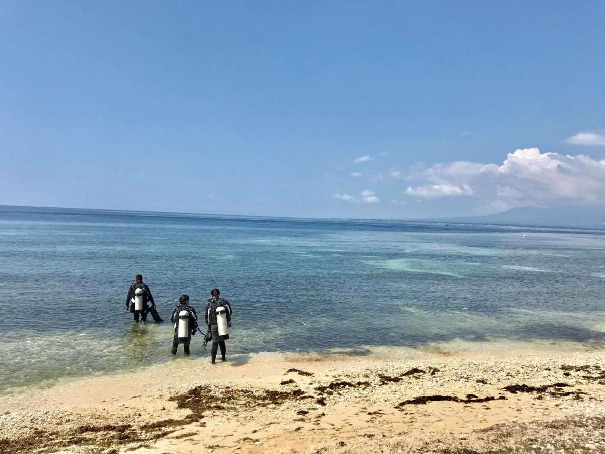 Southseas Beach Resort And Dive Center Santander Esterno foto