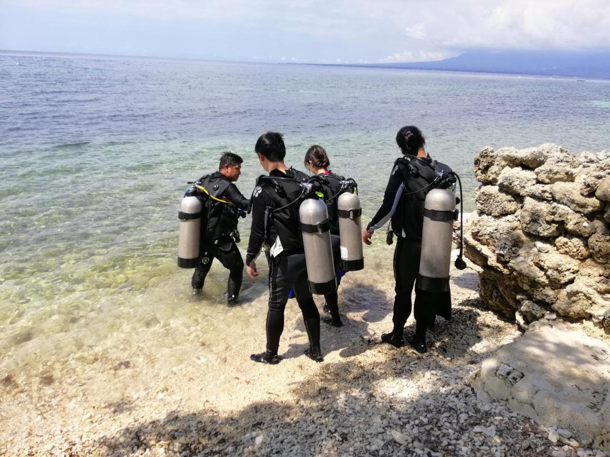 Southseas Beach Resort And Dive Center Santander Esterno foto