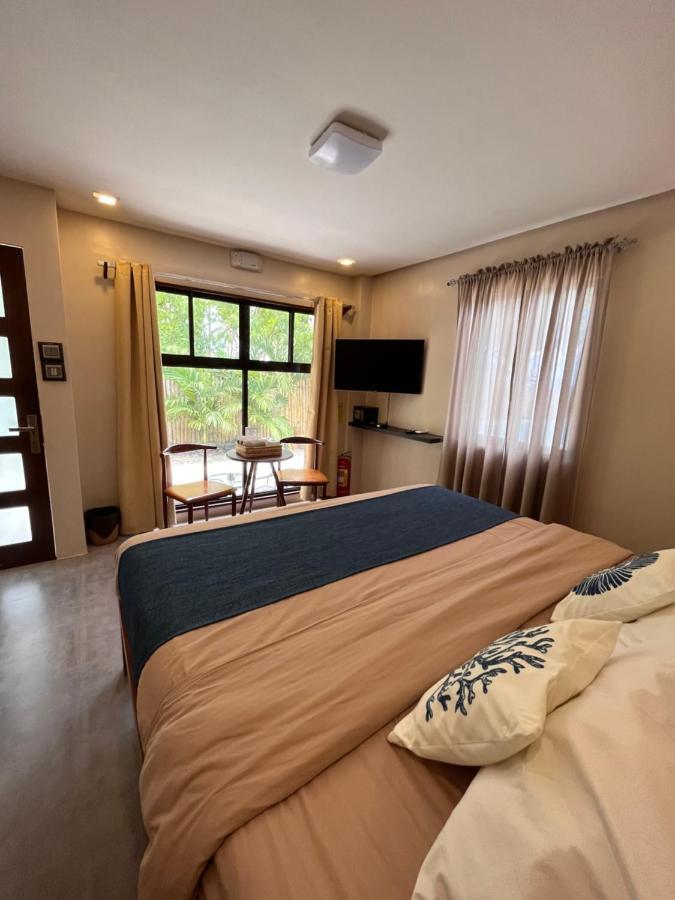 Southseas Beach Resort And Dive Center Santander Esterno foto