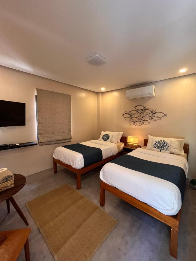 Southseas Beach Resort And Dive Center Santander Esterno foto