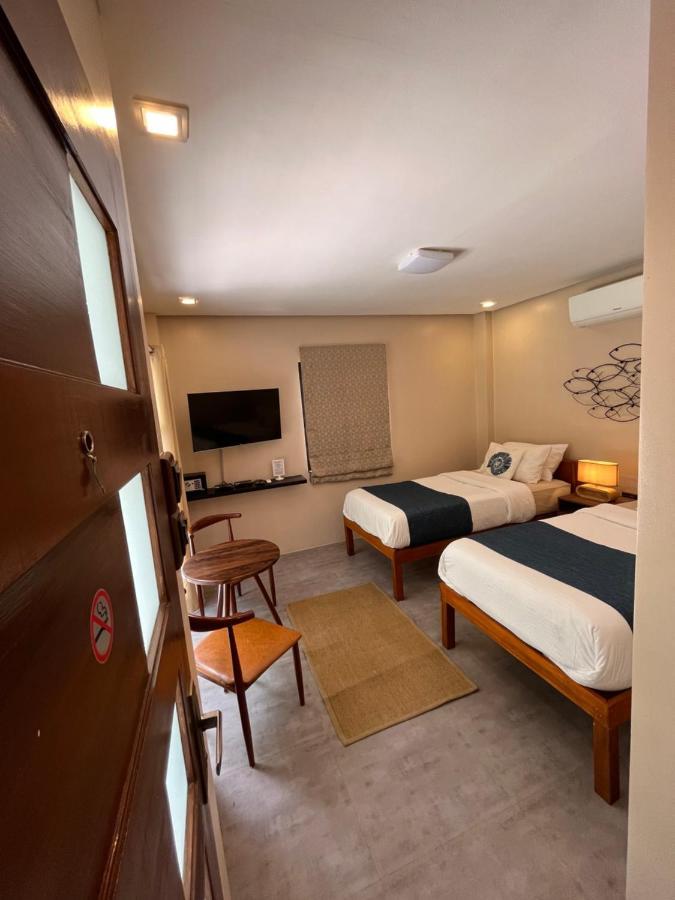 Southseas Beach Resort And Dive Center Santander Esterno foto