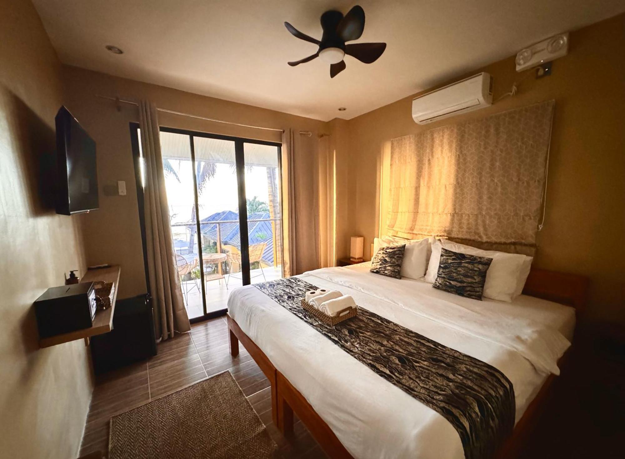 Southseas Beach Resort And Dive Center Santander Esterno foto
