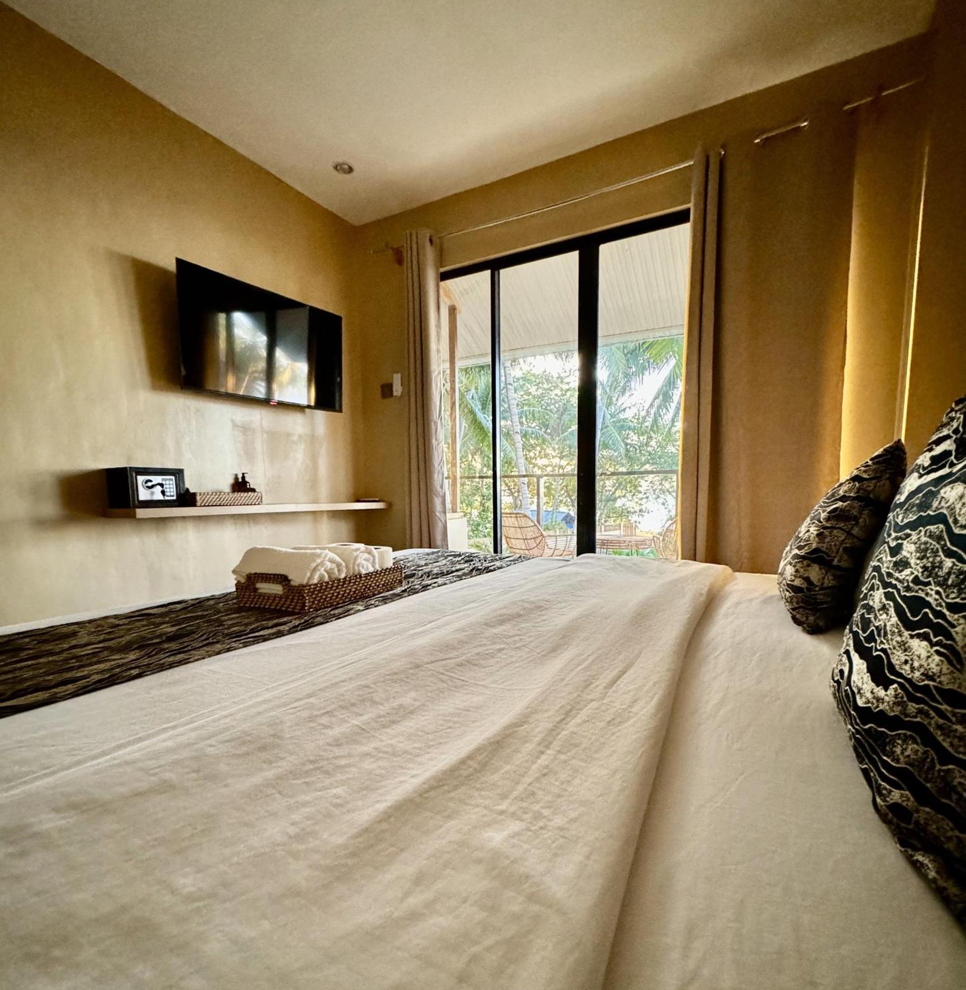 Southseas Beach Resort And Dive Center Santander Esterno foto