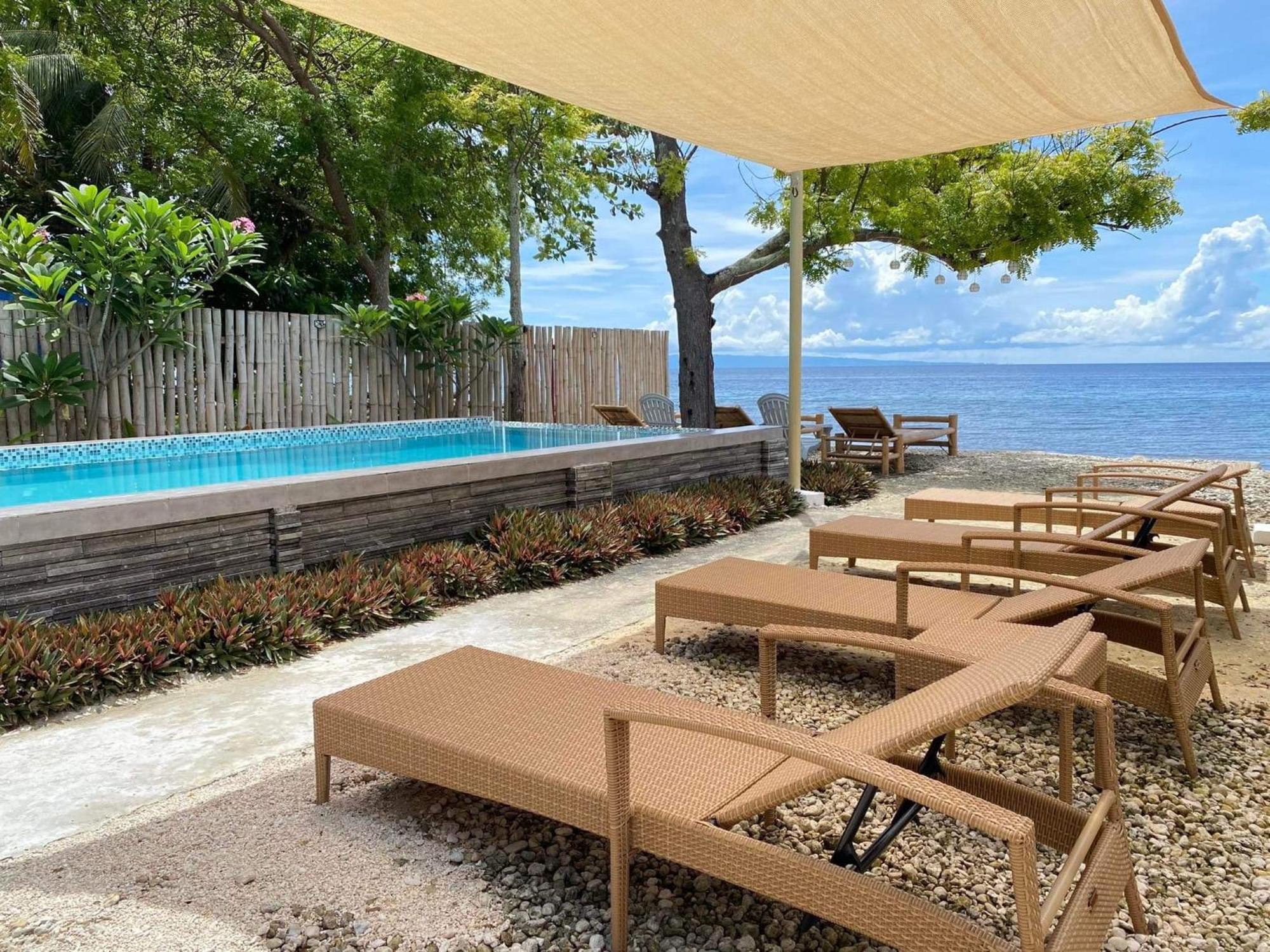 Southseas Beach Resort And Dive Center Santander Esterno foto