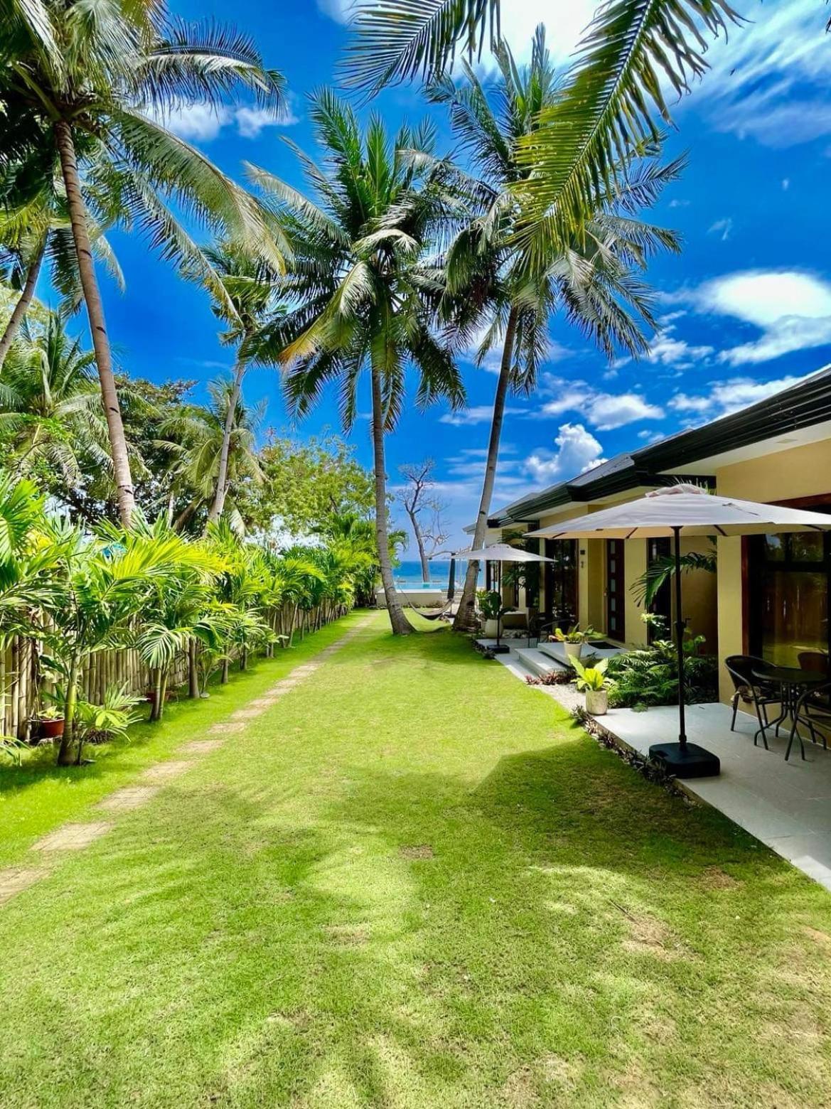 Southseas Beach Resort And Dive Center Santander Esterno foto